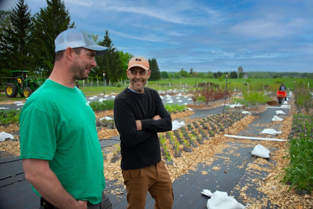 Caleb White of New Leaf Tree Services and Eco Landscapes with David Newman of Arthurs Point Farm at Plant Nursery